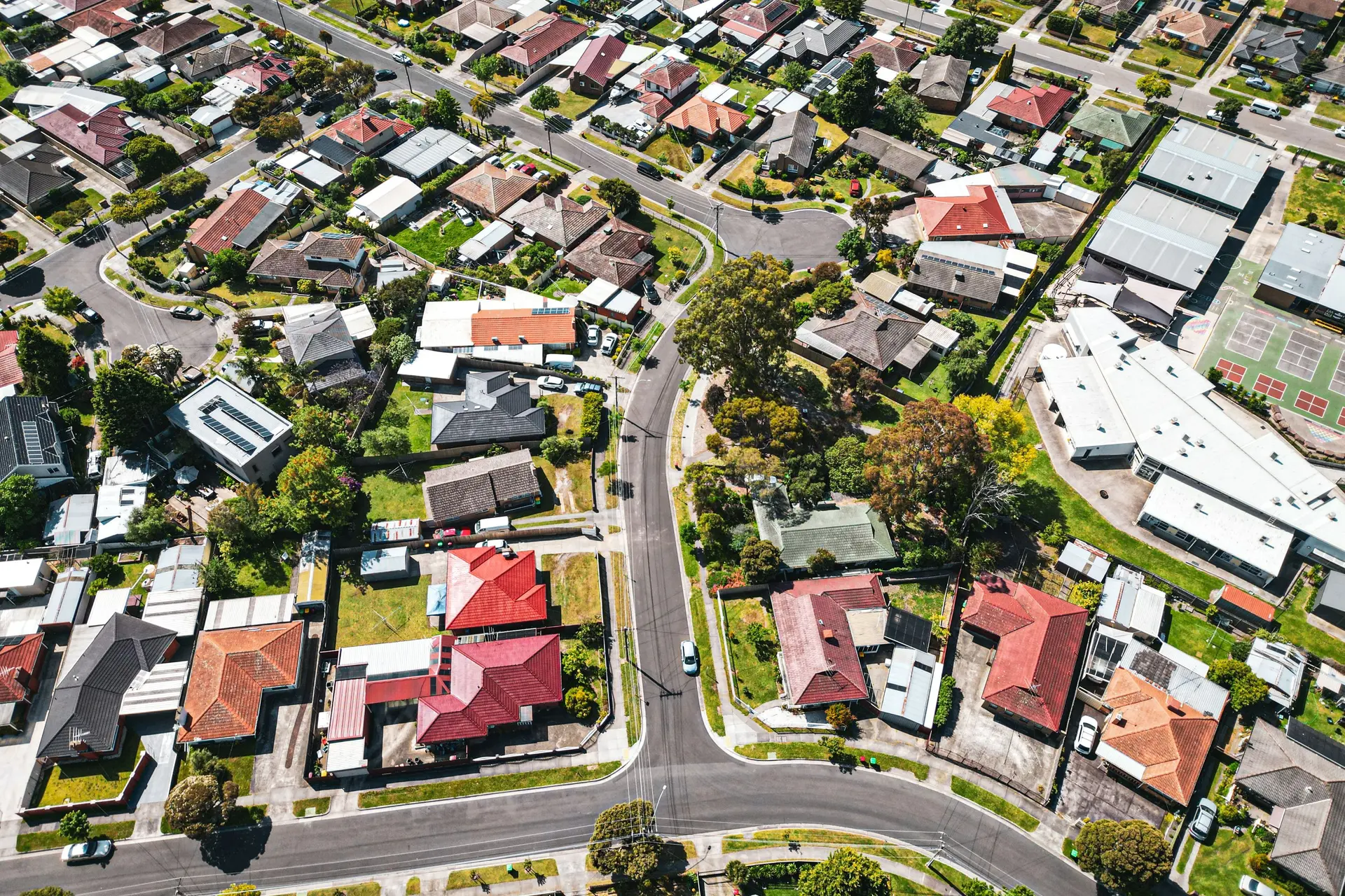 Aerial view of an Australian suburb in Melbourne, streets dividing houses into distinct blocks